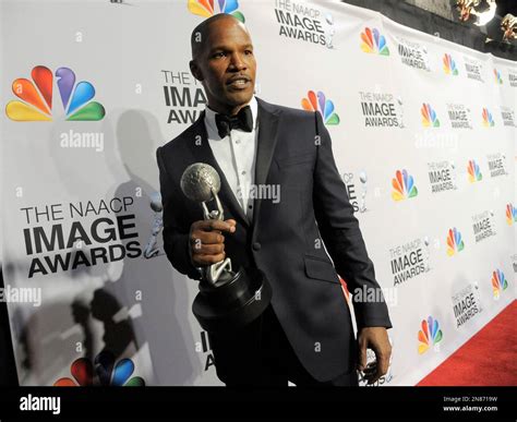 Jamie Foxx Poses Backstage With The Entertainer Of The Year Award At