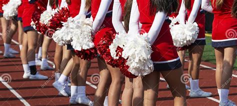 Rear View Of Cheerleaders Holding Pom Poms Behind Them Stock Image Image Of Cheer Background