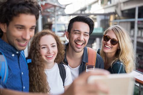 Group Of Friends Talking A Selfie Together By Stocksy Contributor Jovo Jovanovic Stocksy