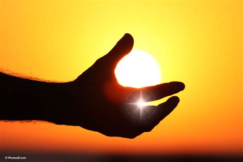 Hand Silhouette Holding The Sun Photo And Wallpaper Free Use Hand