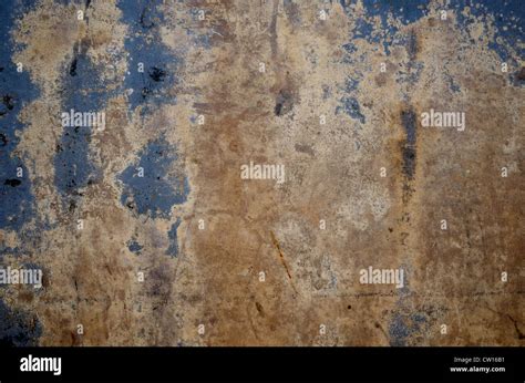 Decaying Wall In Blue Beige And Brown Colours Grungy Background For