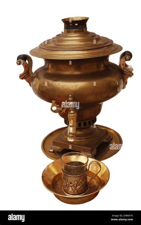 Traditional Russian Brass Samovar And A Glass In A Glass Holder On