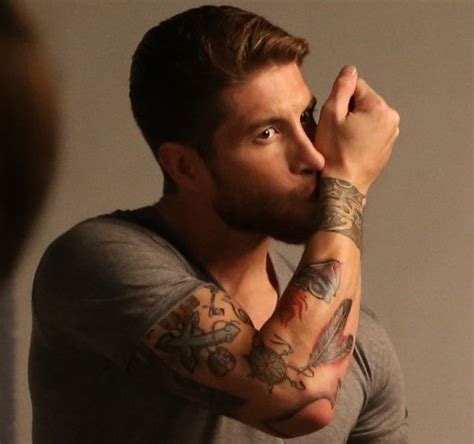 Tattoos are among humanity's most ubiquitous art forms. Sergio Ramos' arm tattoos: you can see many modern symbols ...