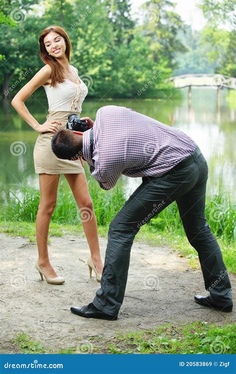 Photographer Takes Photo Of Young Stock Image Image Of Dress