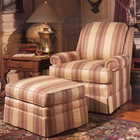 The tan eco leather upholstery makes it versatile and nuetral enough to go with anything. Smith Brothers 971 Upholstered Chair & Ottoman | Story ...