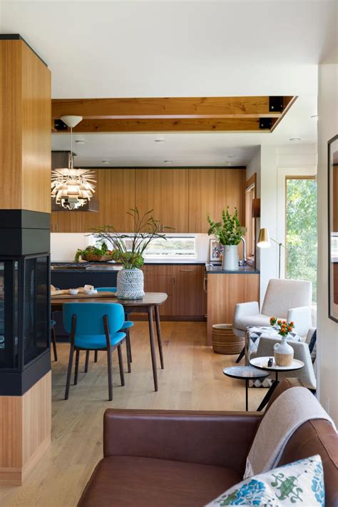 Open Concept Dining Room And Kitchen With Midcentury Modern Furnishings