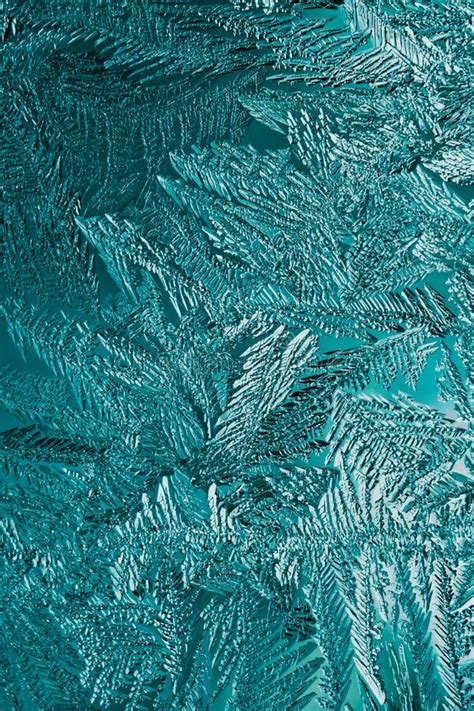 Abstract Christmas Vertical Background Ice Crystals On Frozen Window
