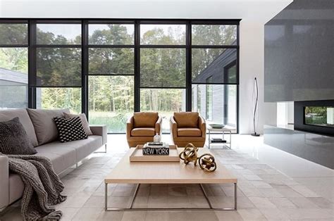 An Open Design Living Space With A Glass Wall Living Room Hackrea
