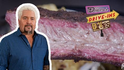 Guy Fieri Eats Righteous Wings And Massive Beef Ribs Diners Drive Ins And Dives Food Network