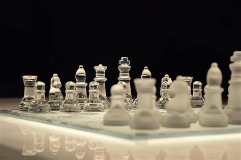 Maybe you would like to learn more about one of these? Royalty-Free photo: Clear glass chess board and piece | PickPik