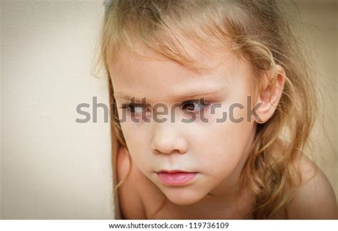 Sad Little Girl Sitting Near Wall Stock Photo Edit Now 119736109