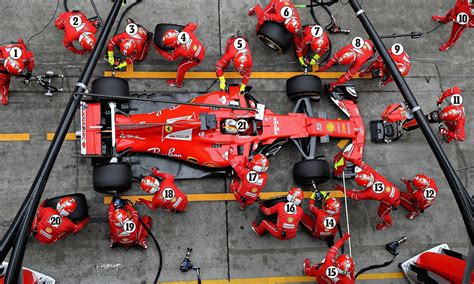 When the car stops in the pit stall, five lug nuts are removed from each tire and they go flying. Formula One pit stop: How does the crew work? | Formula ...