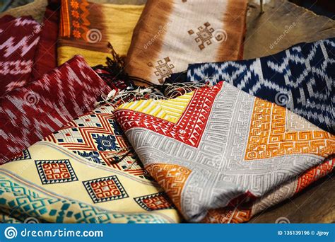 colorful-traditional-hmong-ethnic-indigenous-cloth-fabric-at-a-market-in-luang-prabang-stock