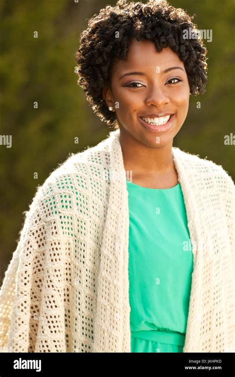 African American Woman Smiling Outside Stock Photo Alamy