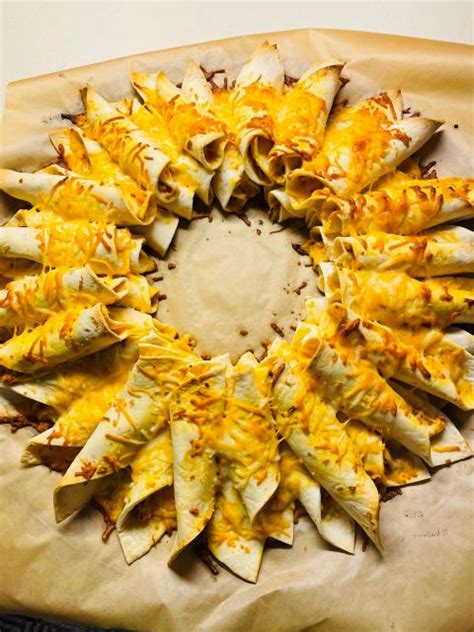 Sprinkle cheddar and monterey jack cheese over the layer. Blooming Chicken Quesadilla Ring | Olive Oil Marketplace