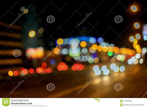 Urban Street Night Traffic With Bokeh Lights Blurred Auto With Bright