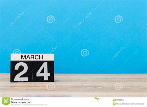 March 24th Day 24 Of Month Calendar On Table With Blue Background