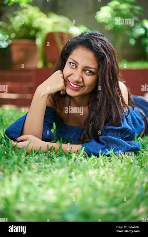 Pretty Young Girl Laying On Grass In Park Stock Photo Alamy