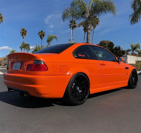 This is a vintage bmw rcaing motorcycle starting and warming up. BMW E46 M3 orange