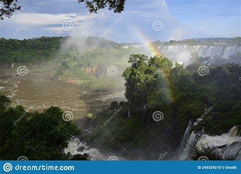 Beautiful View Of Rainbow Over Iguazu Falls One Of The Seven Natural