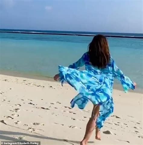 Elizabeth Hurley 54 Dances On The Beach In A Turquoise Bikini