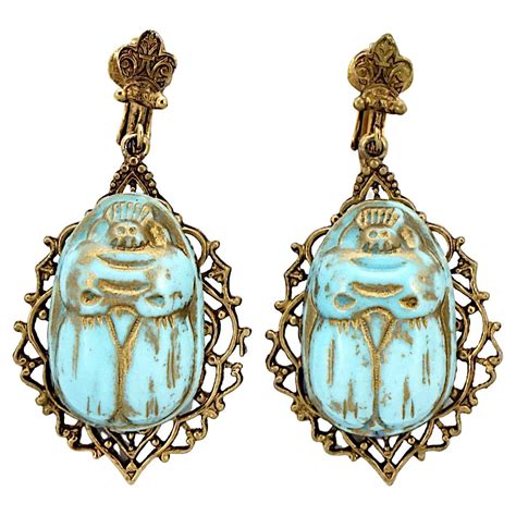 Czech Egyptian Revival Ornate Gold Plated Blue Glass Scarab Clip On Earrings For Sale At 1stdibs