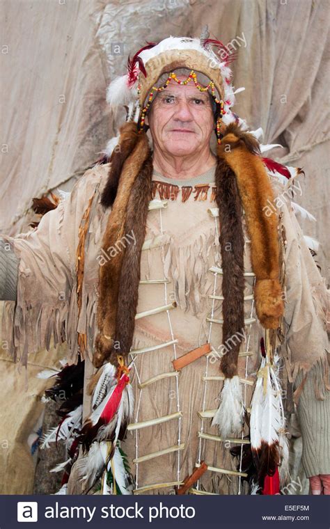 Local Resident Wearing Traditional Native American Clothing Greets Stock Photo Alamy