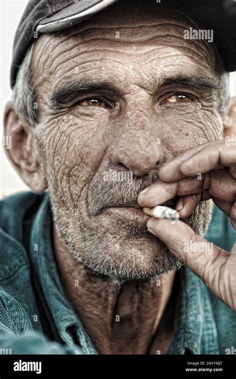Old Man Smoking Stock Photo Alamy