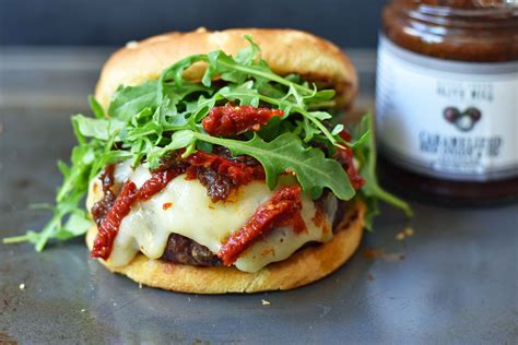 Brie Burger With Caramelized Onions And Sundried Tomatoes Modern Honey