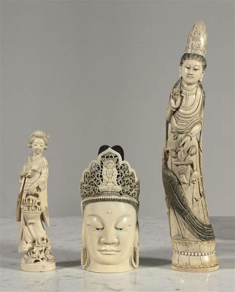 A Chinese Ivory Carving Of A Guanyin Head A Figure Of A Lady And A