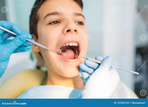 Little Boy With Open Mouth In A Dental Cabinet Stock Photo Image Of