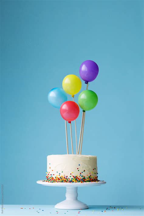 Birthday Cake Decorated With Colorful Balloons By Stocksy Contributor