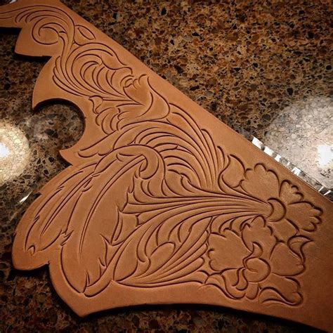 floral and feathers leather carving leather art hand tooled leather custom leather leather