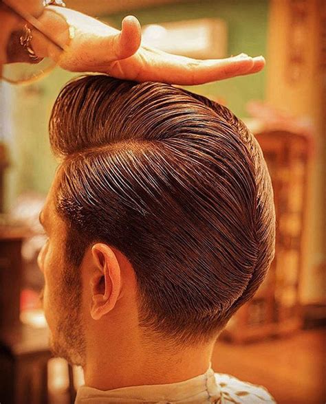 The ducktail pompadour is a men's haircut style popular during the 1950s. 25 Outstanding Ducktail Haircut Variations For Men ...