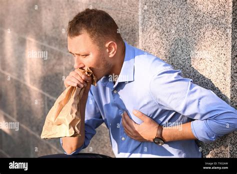 Man Having Panic Attack Outdoors Stock Photo Alamy