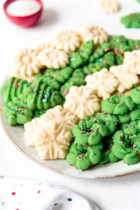 We recommend stacking a few cookies, then wrapping them in foil, and then storing. Spritz Cookies | Spritz cookies, Best christmas cookie ...