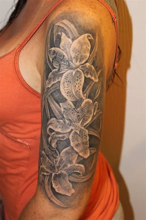 34 Lily Flowers Tattoos On Arm