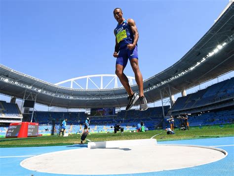 There were a total number of 959 participating athletes from 70 countries. USA's Ashton Eaton competes in the men's decathlon shot ...