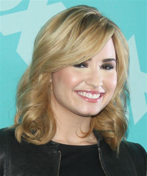 Demi Lovato Medium Wavy Formal Hairstyle Blonde Hair Color With Light