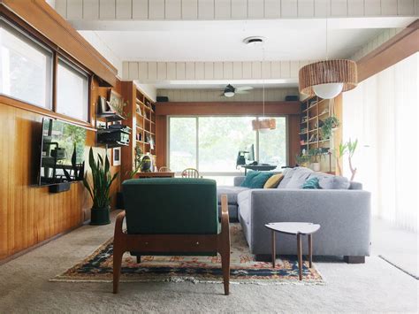 Cozy & Collected Mid-Century Modern Den: Embracing Dated, Original Wood