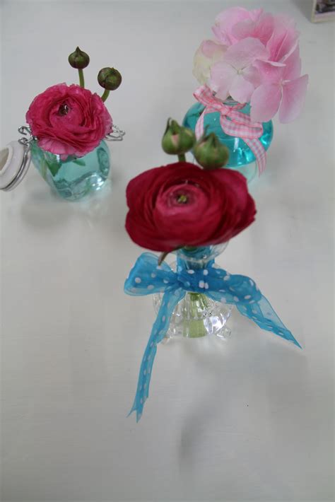 Maybe you would like to learn more about one of these? Turquoise & Pink Wedding Bouquet and Table Designs