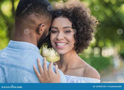Loving African American Couple Hugging In The Park Stock Image Image