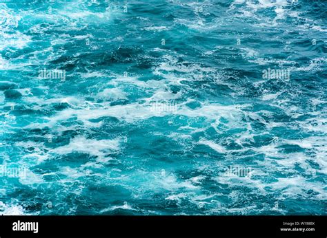 Blue Sea Water Surface Rippled With Foam Stock Photo Alamy