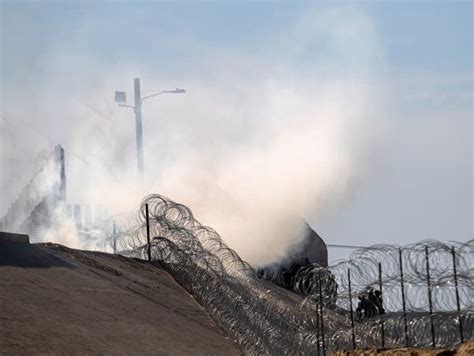 Us Agents Fire Tear Gas As Some Migrants Try To Breach Fence Mpr News