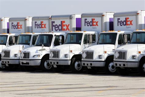 Fleet Of Fedex Delivery Trucks In A Parking Lot Editorial Photography