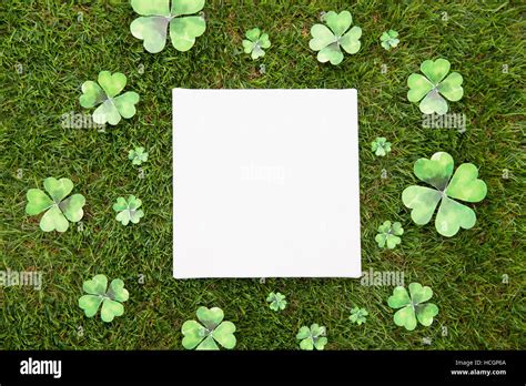 Paper And Four Leaf Clovers Stock Photo Alamy