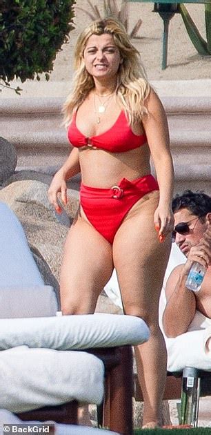 Bebe Rexha Stuns In Stylish Red Bikini As She Soaks Up Some Sun With