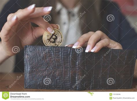 After struggling to buy bitcoin himself, he set out on a mission to make the process of buying bitcoin an easy one for all, and so coinmama was born. Successfully Woman Put A Bitcoin Into Wallet. Crypto Coin Saving. Stock Photo - Image of ...