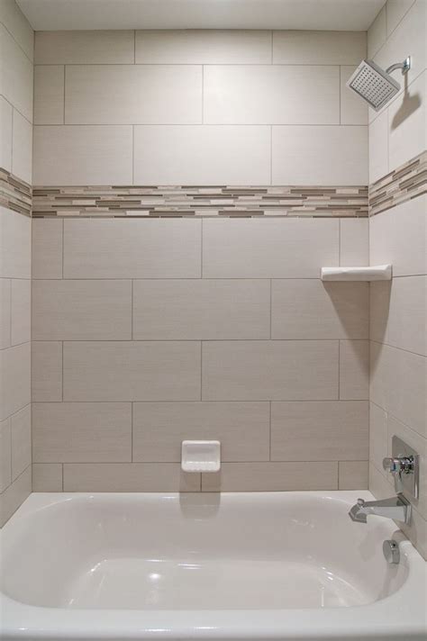 Bathroom tile ideas & basic tile. We love oversized subway tiles in this bathroom! The ...