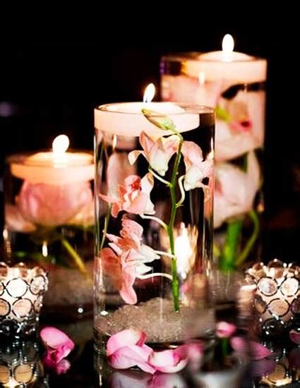 One simple way to make a beautiful paper flower centerpiece is to surround a votive candle holder with paper roses. 30 Ideas for Summer Decorating with Beautiful Flowers and ...